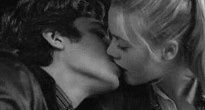 Man And Woman Kissing In Black And White GIF