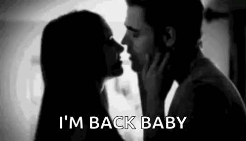 Man And Woman Kissing In Black And White GIF