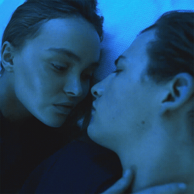 Man And Woman Kissing In Blue Light GIF