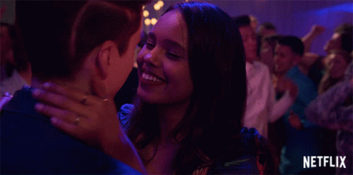 Man And Woman Kissing In Crowd GIF