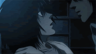 Man And Woman Kissing In Dark GIF