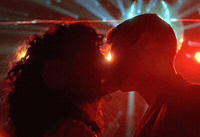 Man And Woman Kissing In Dark Room GIF