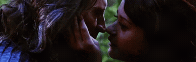 Man And Woman Kissing In Dark Room GIF