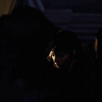Man And Woman Kissing In Dark Room GIF