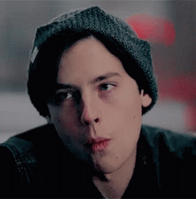 Man And Woman Kissing In Front Of Coca Cola Sign GIF
