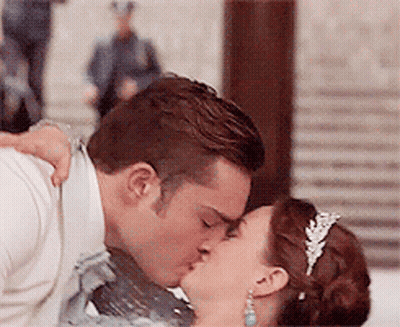 Man And Woman Kissing In Front Of Crowd GIF