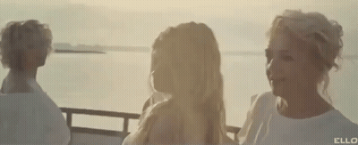 Man And Woman Kissing In Front Of Range Rover GIF