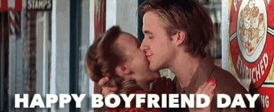 Man And Woman Kissing In Front Of Stamp Shop GIF