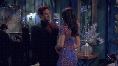 Man And Woman Kissing In Front Of Supper House Sign GIF
