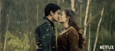 Man And Woman Kissing In Front Of Trees With Netflix GIF