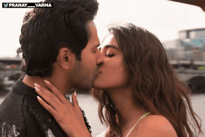 Man And Woman Kissing In Front Of Twitter Logo Pranay Varma GIF
