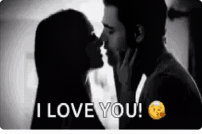 Man And Woman Kissing In Front Of Window GIF