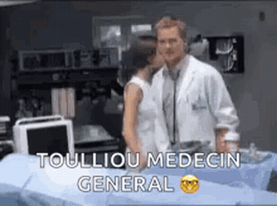 Man And Woman Kissing In Hospital Toulliou Medecin General GIF