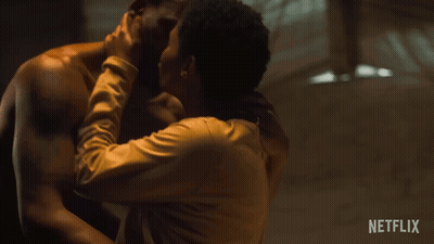 Man And Woman Kissing In Netflix Ad GIF
