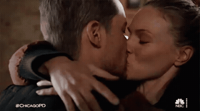 Man And Woman Kissing In Room GIF