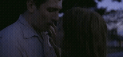 Man And Woman Kissing In The Dark GIF