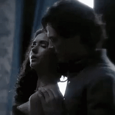 Man And Woman Kissing GIF