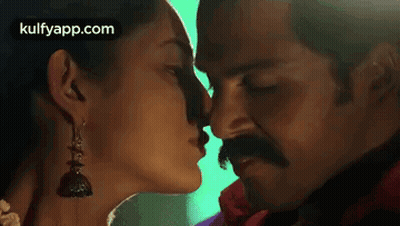 Man And Woman Kissing GIF
