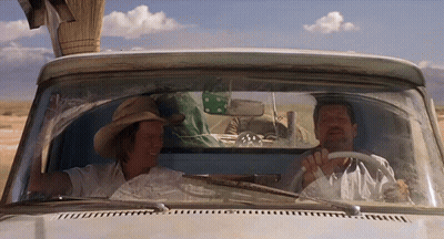 Man And Woman Kissing On A Hill GIF