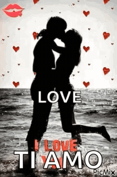 Man And Woman Kissing On Beach GIF