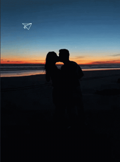 Man And Woman Kissing On Beach 26.03 GIF