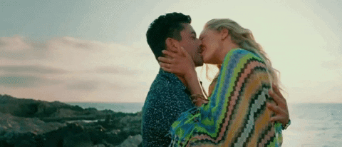 Man And Woman Kissing On Beach GIF