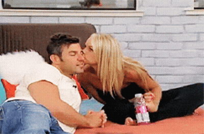 Man And Woman Kissing On Bed GIF