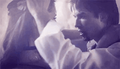Man And Woman Kissing On Cheek GIF