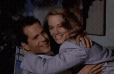 Man And Woman Kissing On Floor GIF