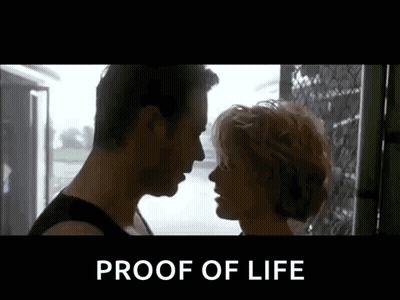 Man And Woman Kissing Proof Of Life GIF