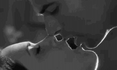 Man And Woman Kissing GIF