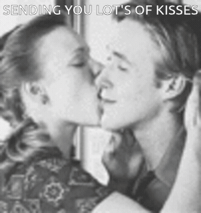 Man And Woman Kissing Sending Kisses GIF