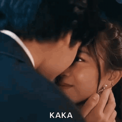Man And Woman Kissing GIF