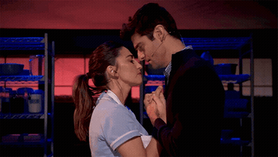 Man And Woman Kissing GIF