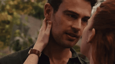 Man And Woman Kissing GIF