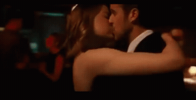 Man And Woman Kissing While Dancing In Club GIF