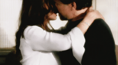 Man And Woman Kissing With Bracelet GIF