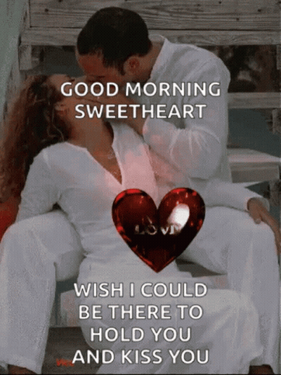 Man And Woman Kissing With Heart GIF