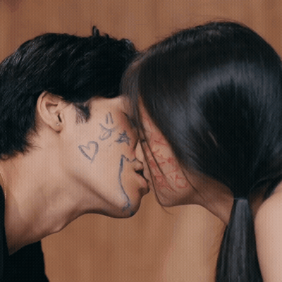 Man And Woman Kissing With Hearts And Stars GIF