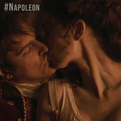 Man And Woman Kissing With Napoleon GIF