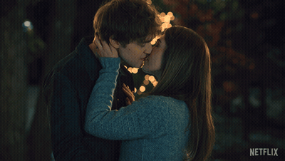Man And Woman Kissing With Netflix Logo GIF