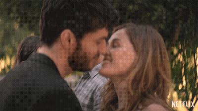 Man and Woman Kissing With Netflix Logo