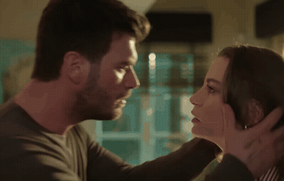 Man And Woman Kissing With Tattoo On Hand GIF