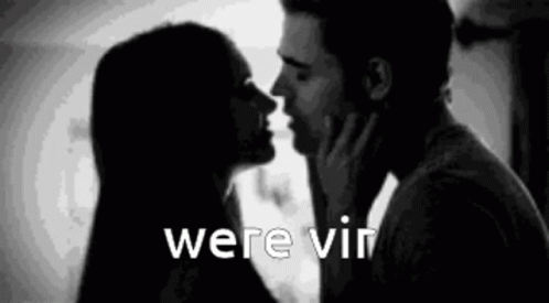 Man And Woman Kissing With Were Vin GIF
