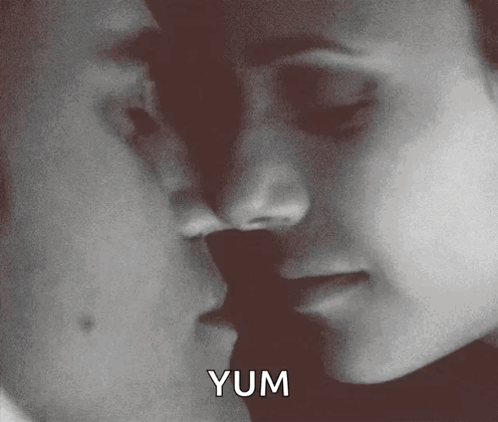 Man And Woman Kissing With Yum GIF