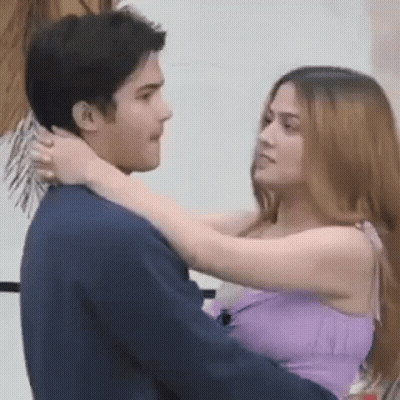 Man And Woman Kissing, Woman In Purple Dress GIF