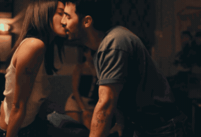 Man And Woman Kissing Woman In White Tank Top GIF
