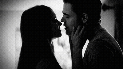 Man And Woman Kissing GIF