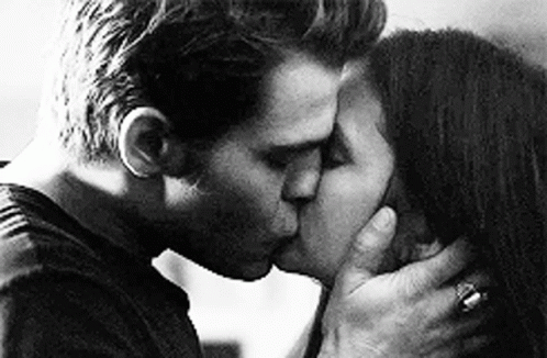 Man And Woman Kissing GIF