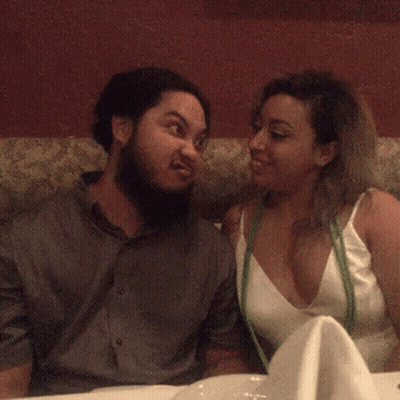 Man And Woman Laughing At Each Other GIF